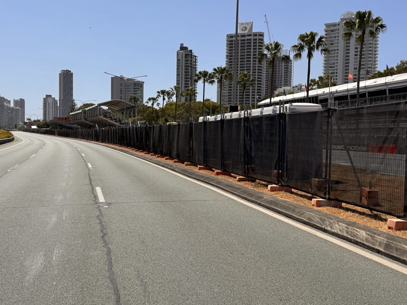 Crowd control barriers lining a large-scale outdoor spectator event