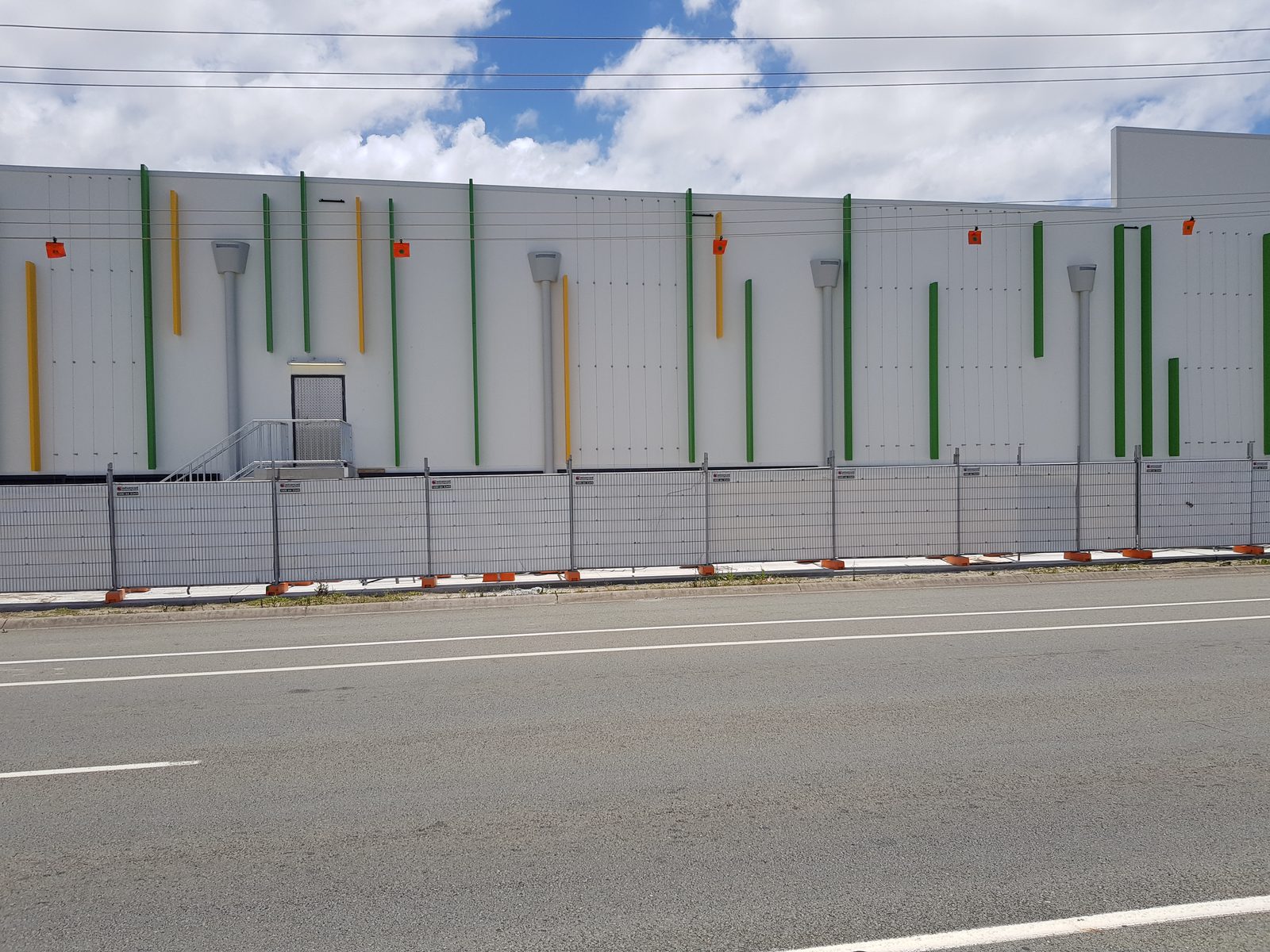 Temporary hoarding fencing being installed on site